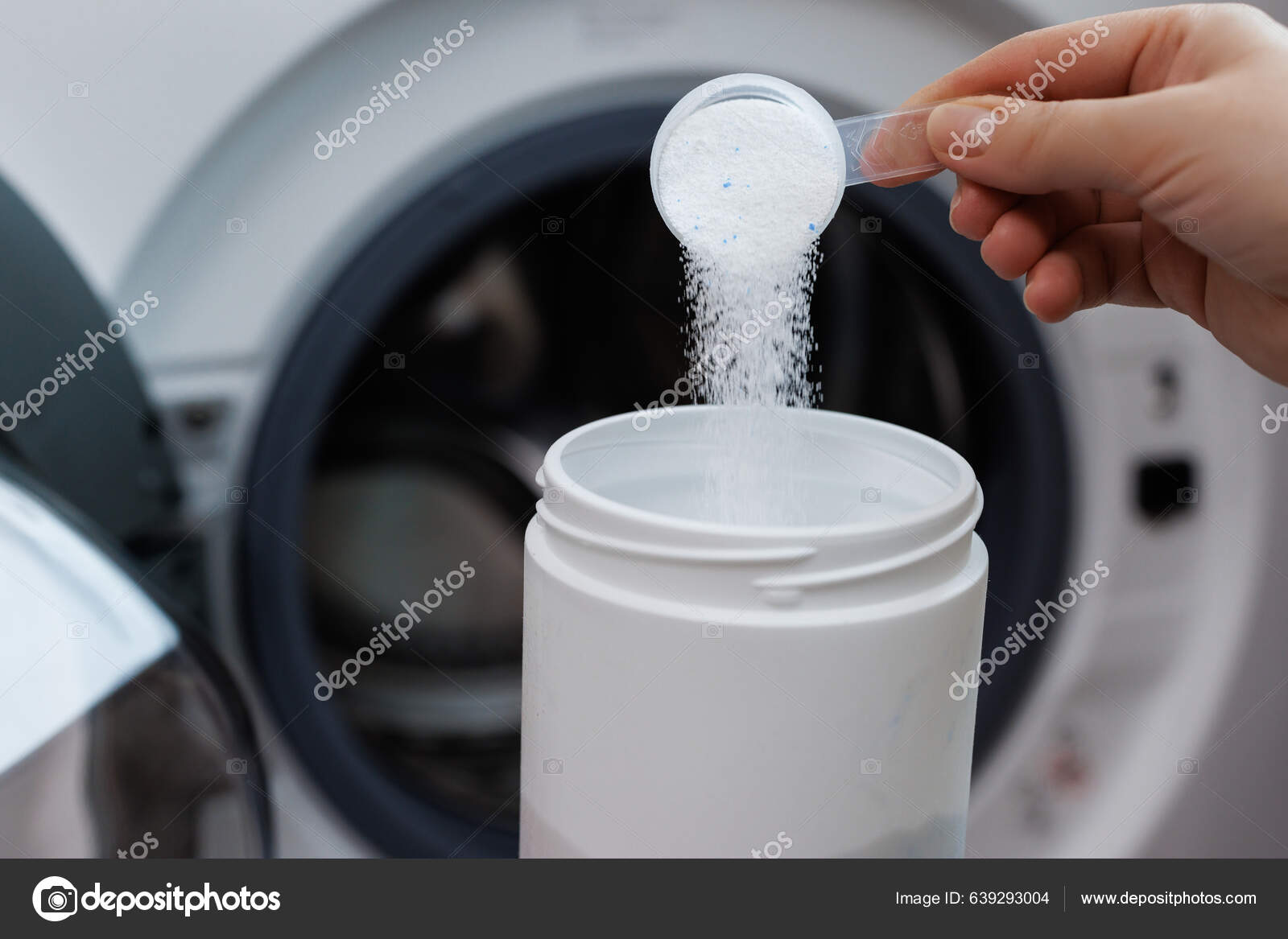 Woman Hand Pouring Washing Powder Measuring Cup Granular Solid Detergent  Stock Photo by ©uflypro 639293004